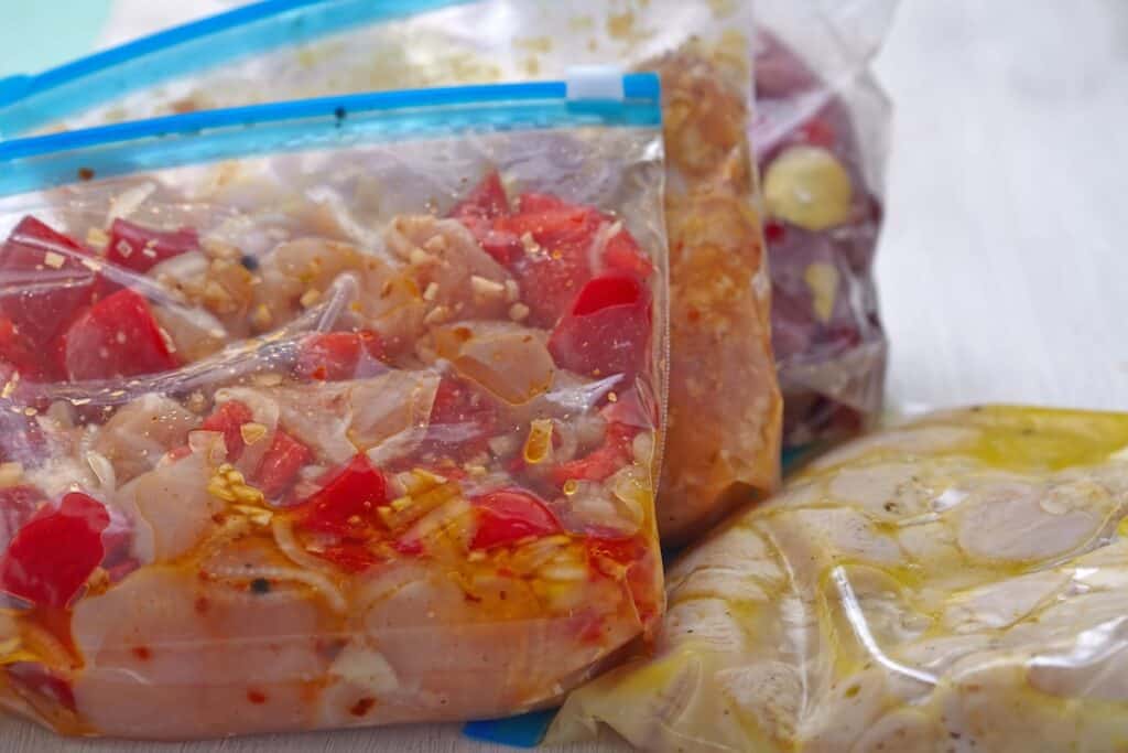 Ziplock bags full of frozen food.